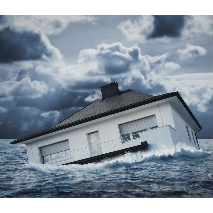 House floating in sea of water.